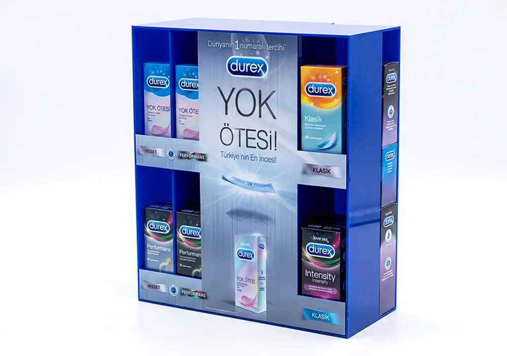Durex pleksi kondom standı, prezervatif ve tüketici sağlığı ürünleri için tasarlanmış akrilik tezgah üstü teşhir standı