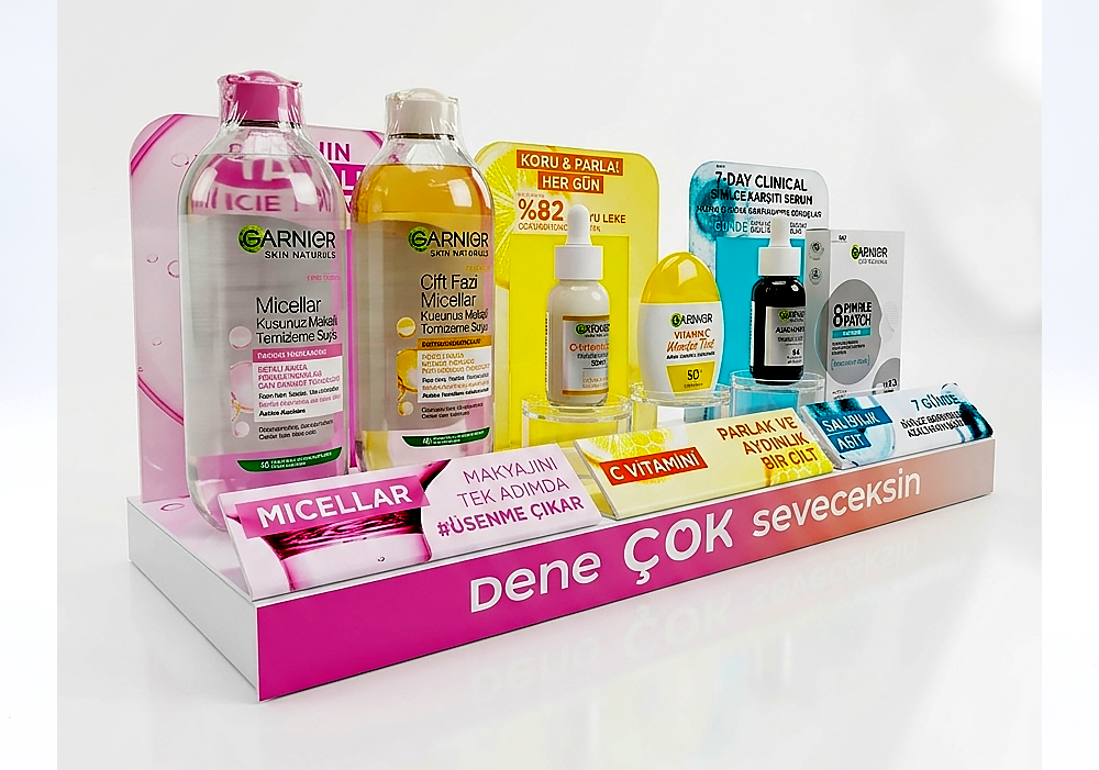 Garnier tezgah üzeri makyaj standı, cilt bakım ve kozmetik ürünleri için tasarlanmış masa üstü teşhir standı
